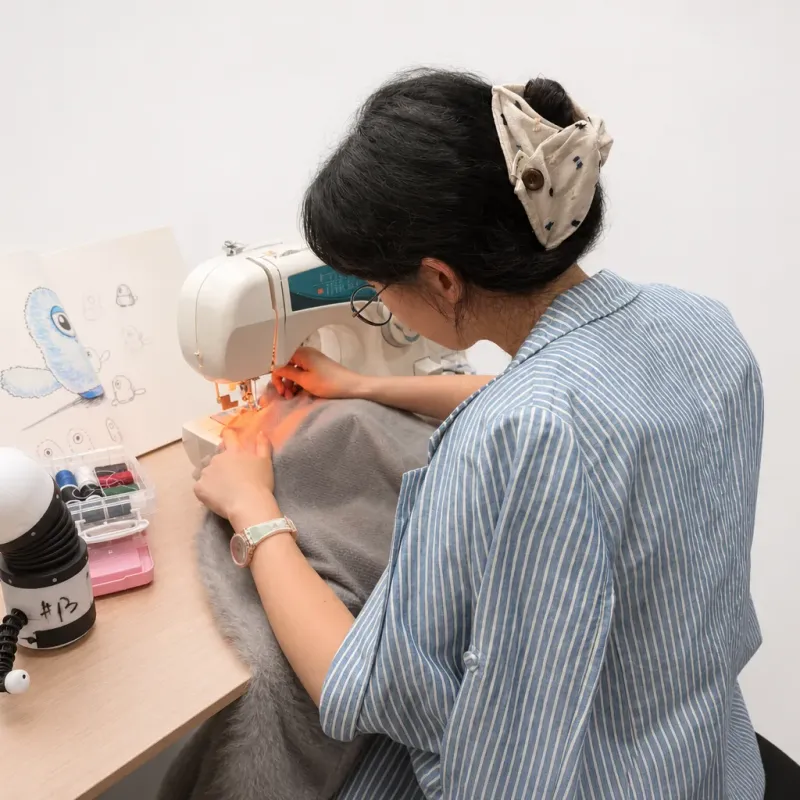 Sewing a prototype robot garment on a sewing machine